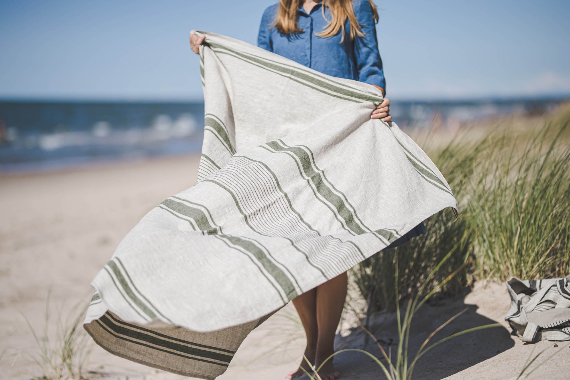 Linen beach towel with green stripes