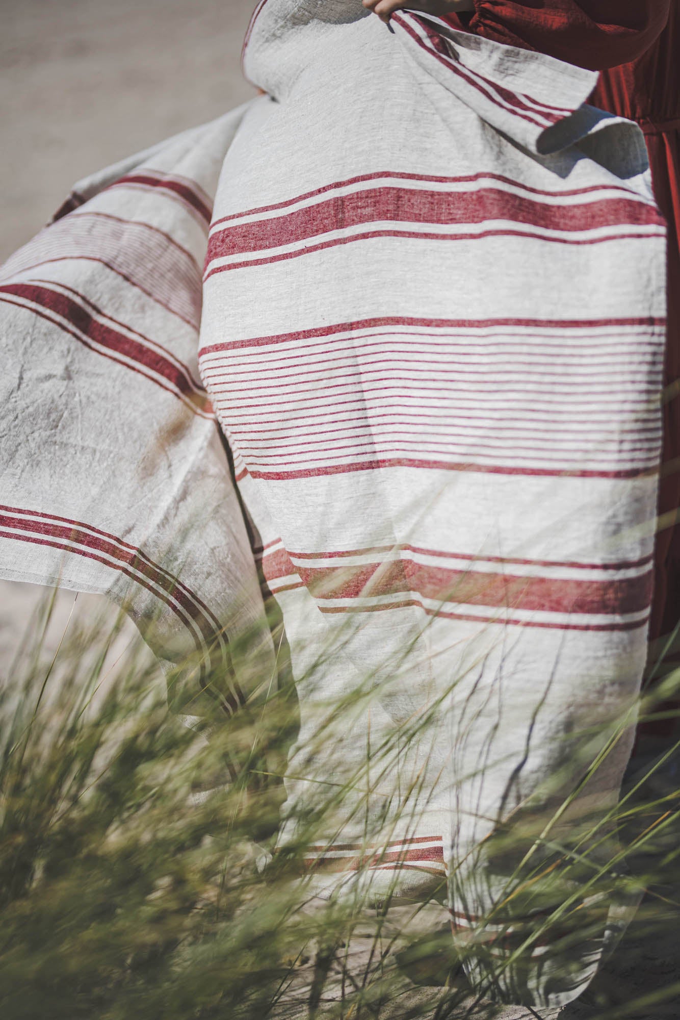 Linen beach towel with cherry red stripes