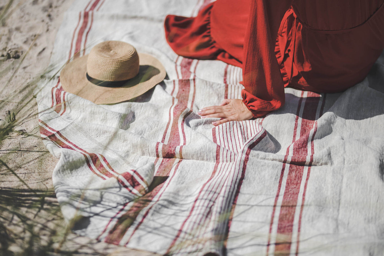 Linen beach towel with cherry red stripes