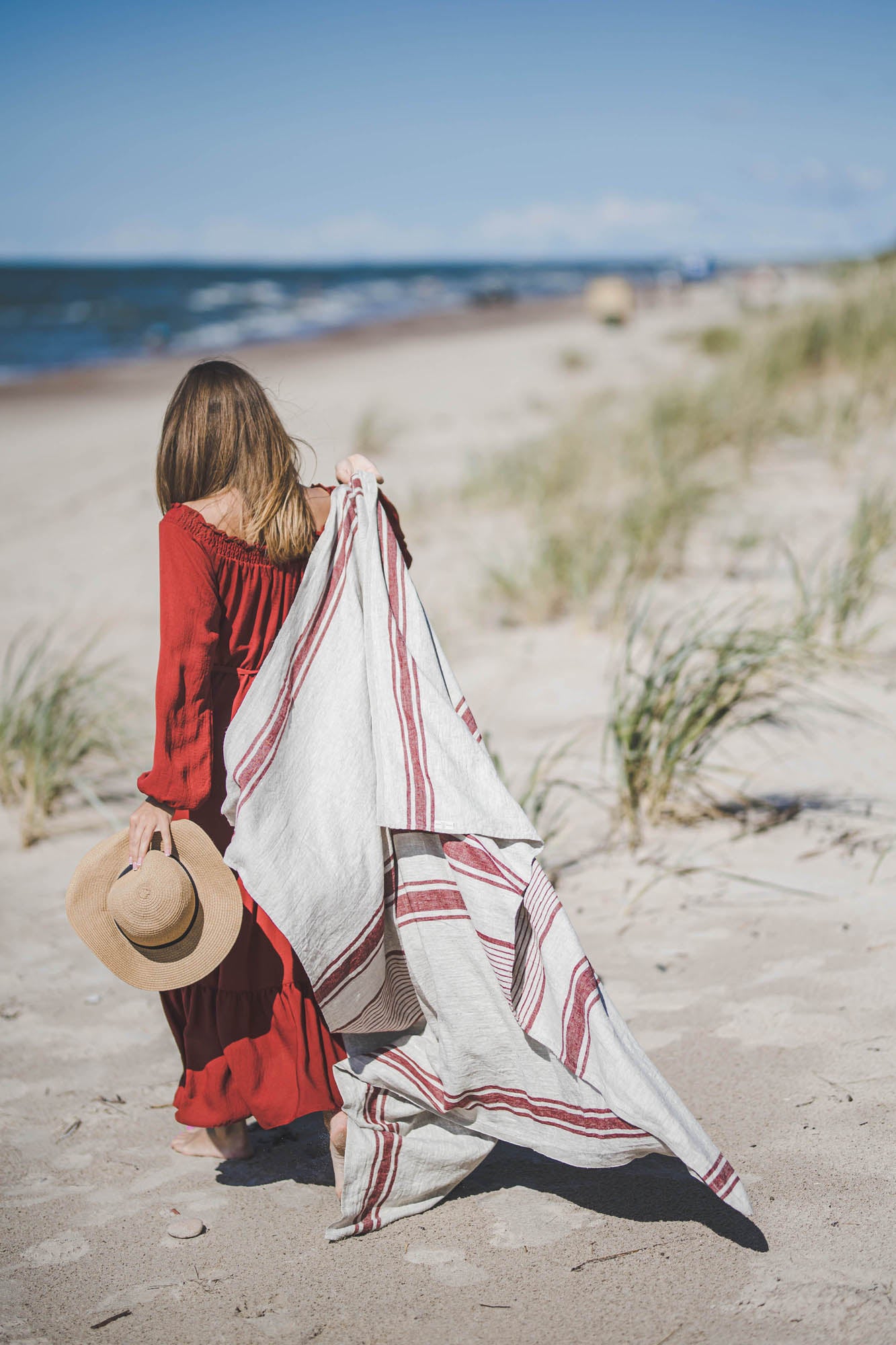 Linen beach towel with cherry red stripes