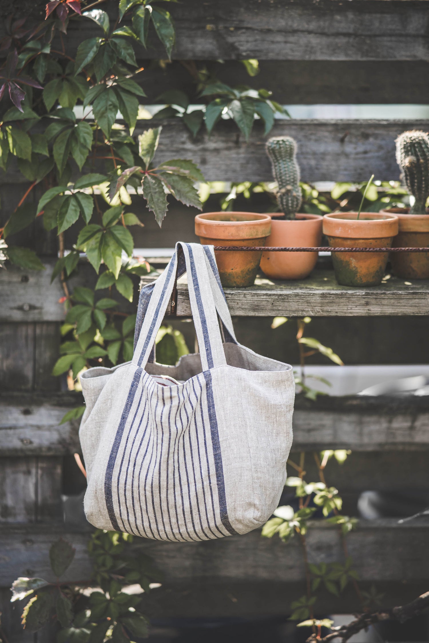 Linen handbag with blue stripes